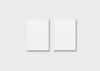 Fototapeta premium Two canvas hang on white wall mockup