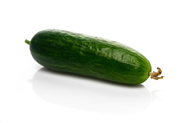 Fresh green cucumber resting on a clean surface ready for culinary creations and healthy snacks