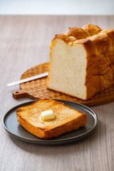 Buttered toast and white bread.
Delicious white bread image.