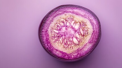Vibrant cross-section of purple vegetable revealing intricate patterns and textures against a pastel background