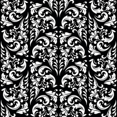 Wallpaper in the style of Baroque. Seamless vector background. White and black floral ornament. Graphic pattern for fabric, wallpaper, packaging. Ornate Damask flower ornament.