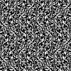 Wallpaper in the style of Baroque. Seamless vector background. White and black floral ornament. Graphic pattern for fabric, wallpaper, packaging. Ornate Damask flower ornament.