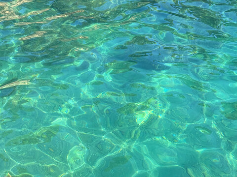 Turquoise ocean water clear surface.