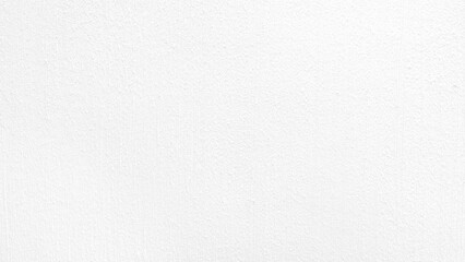 close-up view of a light white wall with a subtle, fine-grained texture, creating a modern and inviting. white backdrop with a slightly rough, almost sandy feel.