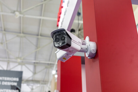 Tashkent, Uzbekistan - March 03, 2023 : Surveillance cameras and Hikvision intercom. Equipment for fixing traffic on the road and recognizing people. Security system for home and society