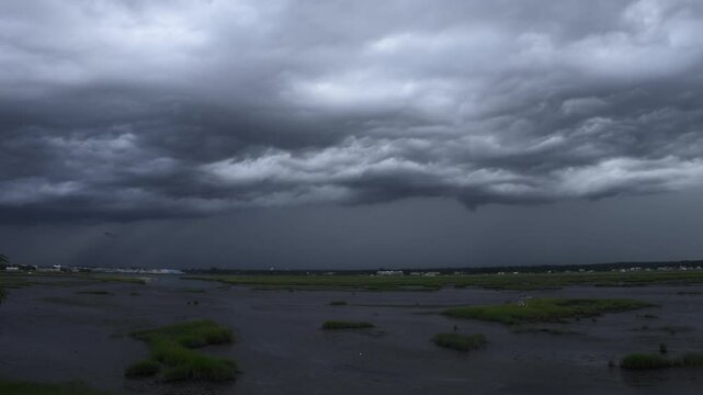 Timelapse clip of a brutal thunderstorm cold front rolling in on the Connecticut coastline over the summer.