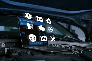 Laptop on car engine with floating diagnostic icons, representing modern vehicle diagnostics, repair, and digital maintenance