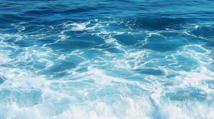 Pure blue turquoise water texture of the ocean sea with foam from and waves