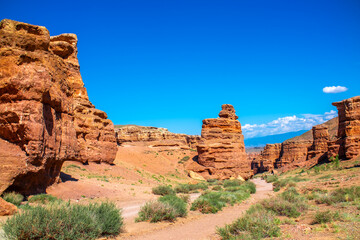 Charyn Canyon, Valley of Castles. The excellence of Kazakhstan. Panorama of natural unusual landscape. The red canyon of extraordinary beauty looks like a Martian landscape.