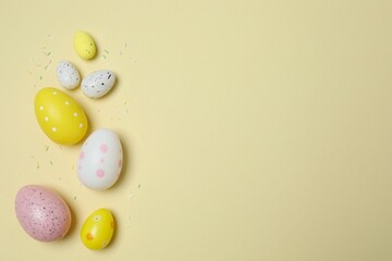 Colorful eggs on pastel color backdrop, space for your text or advertisement