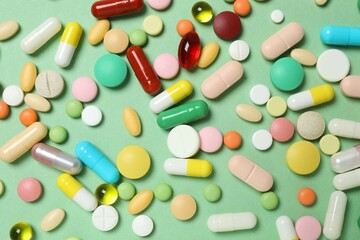 Various pills on color background
