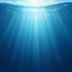 the sun's rays shine into the depths of the ocean, sunlight underwater, impressive seascape, beautiful and calm blue water surface, beautiful nature as a background