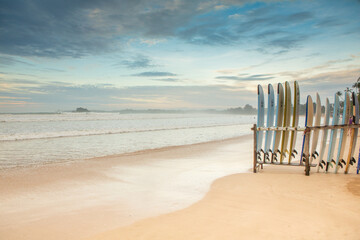 Weligama is known for its consistent, gentle waves, making it one of the best spots in Sri Lanka for beginners to learn surfing. © Nomad Pixel