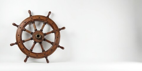 Antique Wooden Ship Wheel on White Background A Nautical Decorative Item for Home Decor or Maritime Themed Spaces