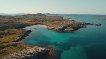 Fototapeta premium Stunning coastal view with turquoise waters and rocky islands under a clear sky.