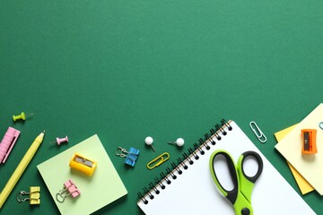 Flat lay with school stationery and noyebook on color background, top view © Sunlight