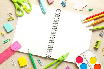 Flat lay with school stationery on wooden background, top view © Sunlight