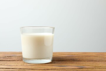 Glass of milk on the table 