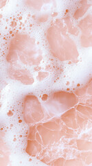 Fototapeta premium Bubbly foam over smooth pink marble texture, abstract art concept, pastel aesthetic design