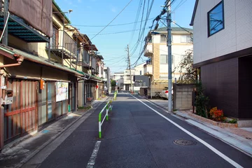 Papier peint photo Ruelle étroite Typical narrow street in Tokyo, Japan.  © LilyRosePhotos