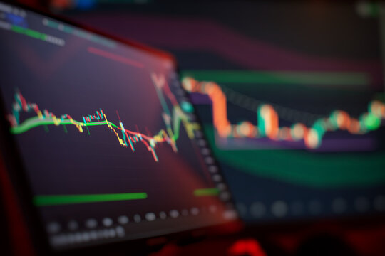 Abstract digital financial chart with colored candlestick charts, trend lines and network data visualization