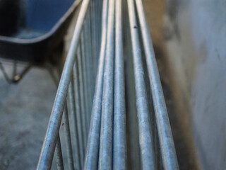 Close-Up of Iron Bars with Blurred Background in Blue and Gray Tones