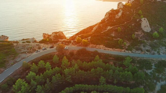 Aerial view of the picturesque Route de Crete near Cassis at sunset, France