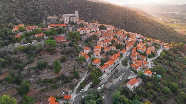 Aerial view of Eus, the medieval hilltop town in Pyrenees mountains, France. 