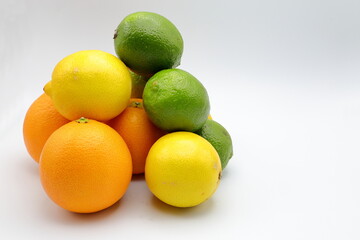 Citrus fruits with different colors. Oranges, lemons and lime. 
