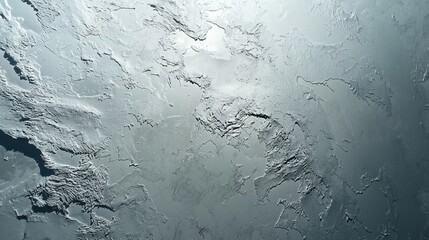 Fototapeta premium Details show the intricate patterns formed by freezing water under sunlight in a remote area. The surface reflects light and showcases the natural beauty of winter