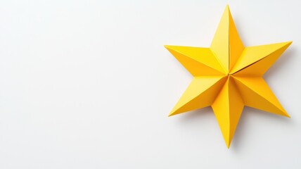 Fototapeta premium Bright Yellow Star Icon on Plain White Background for Creative Design Projects