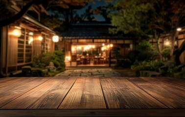 Empty wooden table top with a blurred background of an outdoor Japanese restaurant at night, suitable for product display, food, 