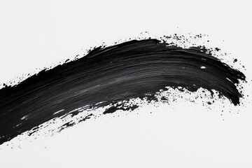 Black paint stroke on a white canvas showcasing artistic expression and creativity in a minimalist...