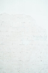 Fototapeta premium A beautifully minimalist white wall that artfully showcases subtle textures along with natural imperfections