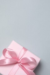 Beautiful gift box on gray background