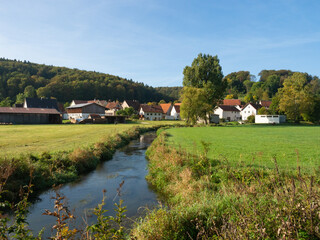 Schwaebische Alb, Germany - October 2nd 2023: Idyllic valley of the Lauter river with villages and fields