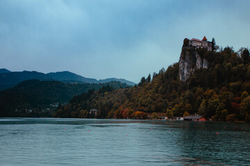 Bled, Slovenia View of the pure Lake Bled, the magnificent castle rock with The Bled Castle in the distance