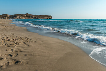 Mediterranean seacoast at the Patara beach on a sunny day with blue sea Antalya region, Turkey.