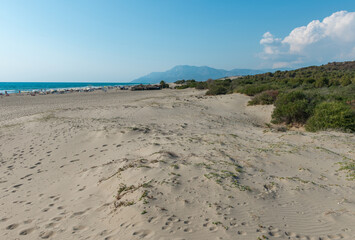 Mediterranean seacoast at the Patara beach on a sunny day with blue sea Antalya region, Turkey.