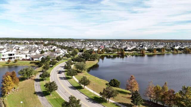 A car drives through the streets of the Lake Nona area of Orlando in Orange County, Florida.