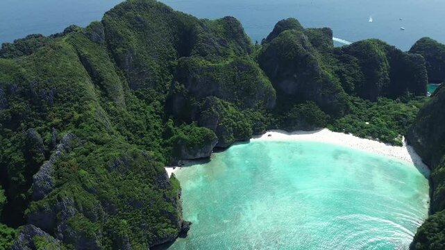 World famous Maya Bay in Phi Phi Islands, 4k drone video, high altitude view of popular bay in Thailand