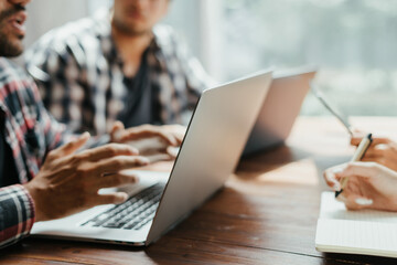 Group of young people working together. Creative business people in modern office