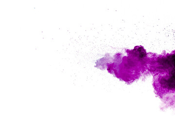Purple particles explosion on white background.Freeze motion of purple dust splash on background.