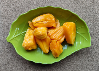 Peeled jackfruit, Stack of ripe jackfruit slices. Sweet jackfruit.