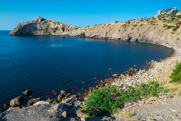 Fototapeta premium Picturesque seascape with beautiful view of Cape Kapchik and the Black Sea. Crimean Peninsula. Russia