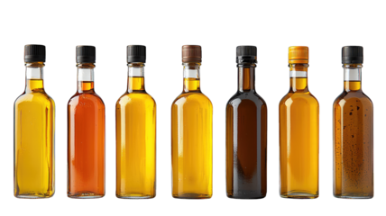 Various oil bottles in a row on dark background for product display