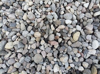 Gravel is small rock, usually crushed granite. The size of gravel that is always used is between 2 until 75 mm. Gravel is often used in the construction of roads, railway sleepers andmake a bricks.