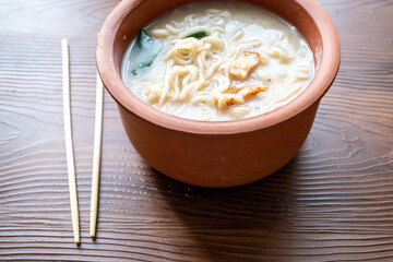 shoyu ramen in traditional bowl close up