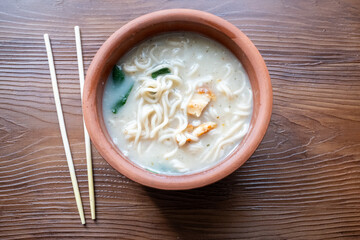 shoyu ramen in traditional bowl close up