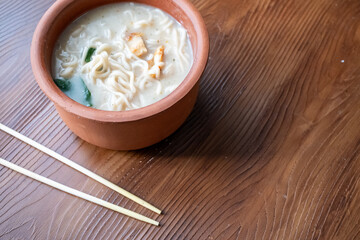 shoyu ramen in traditional bowl close up